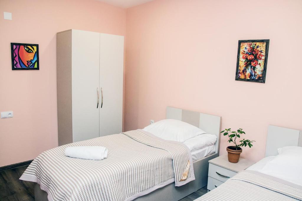 Postel nebo postele na pokoji v ubytování Red Hotel