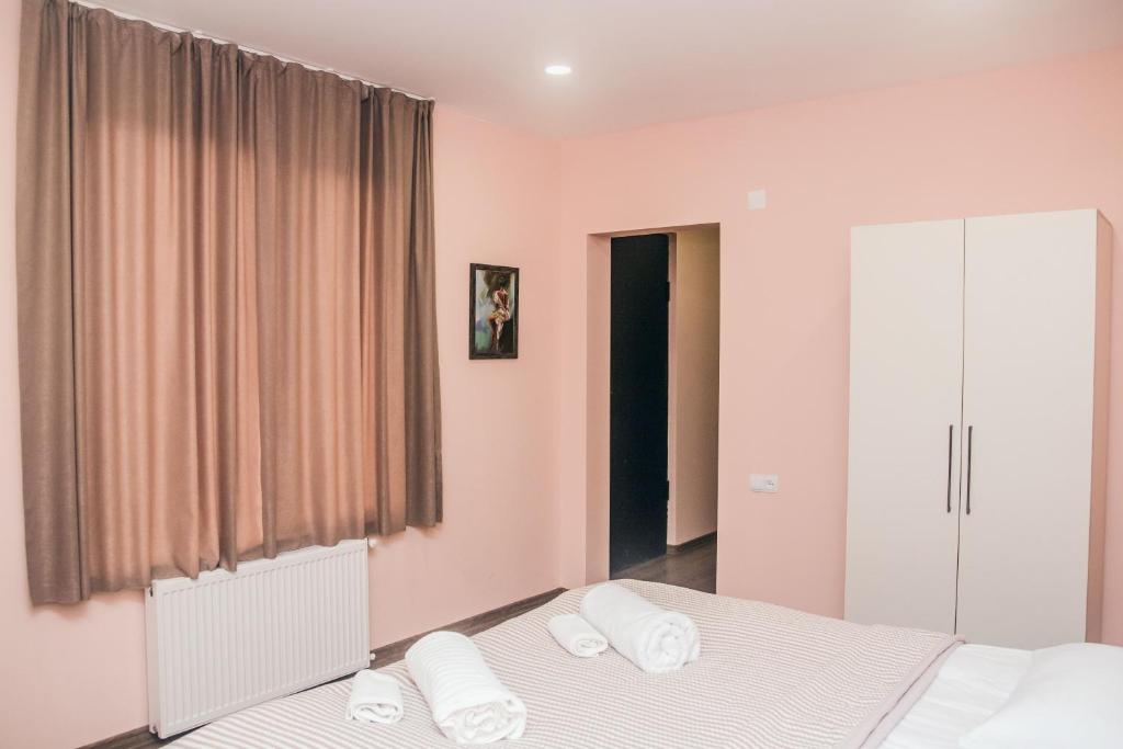 Postel nebo postele na pokoji v ubytování Red Hotel
