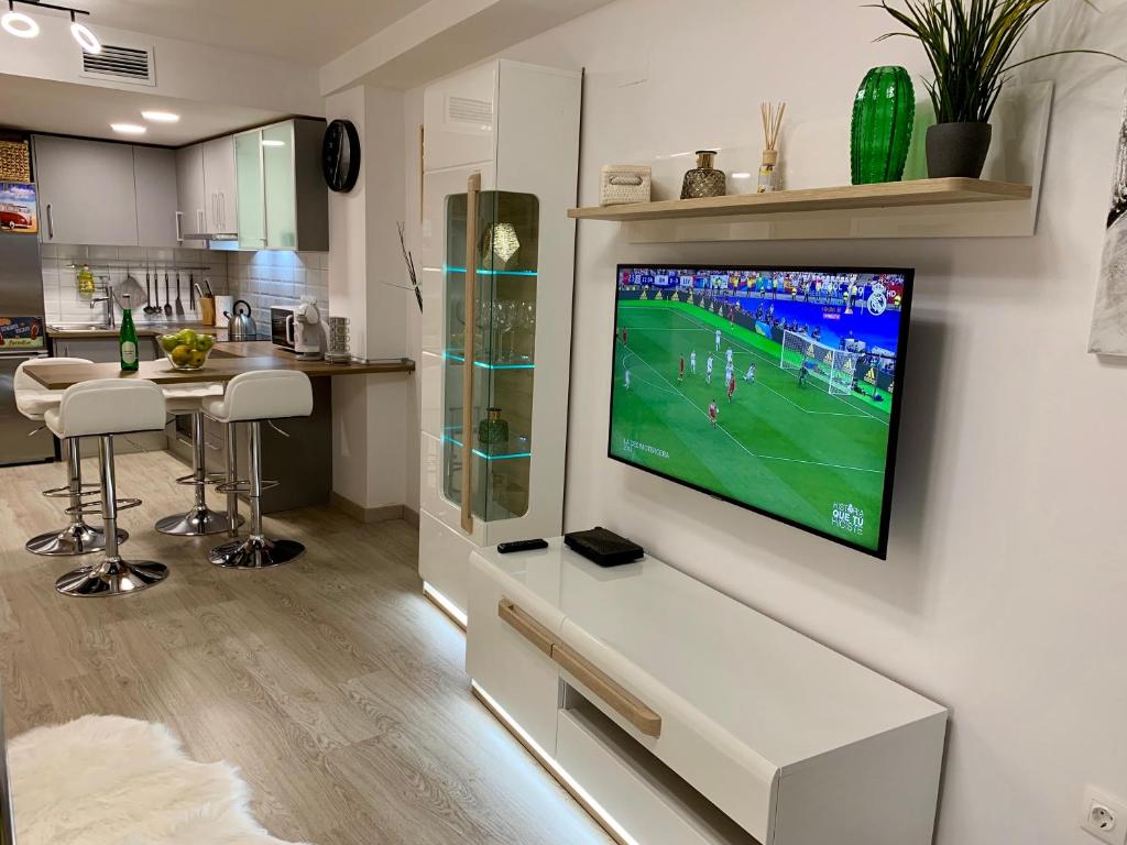 TV a/nebo společenská místnost v ubytování Dream Loft Old city center