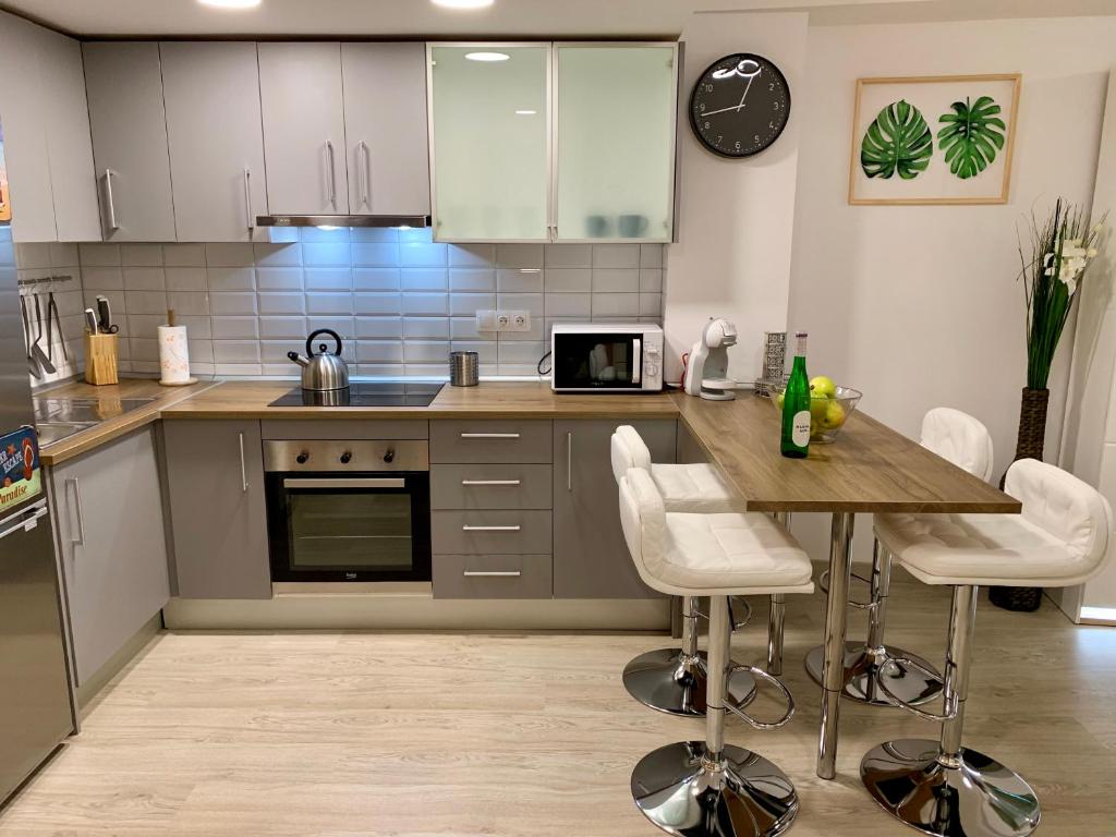Kuchyň nebo kuchyňský kout v ubytování Dream Loft Old city center