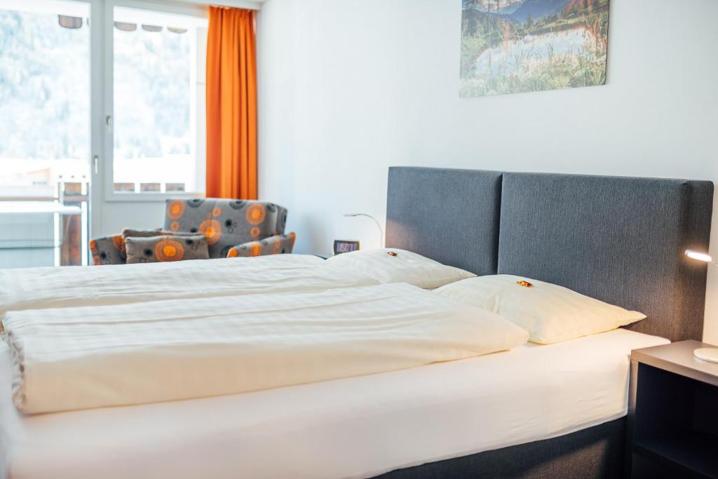 Postel nebo postele na pokoji v ubytování Hotel Restaurant La Furca