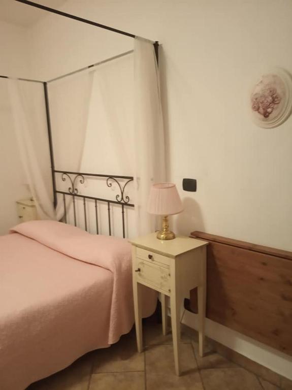 Postel nebo postele na pokoji v ubytování Il Portico