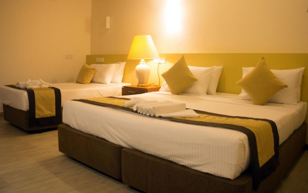 Postel nebo postele na pokoji v ubytování Beach Corridor Hotel & Spa with Free Airport shuttle