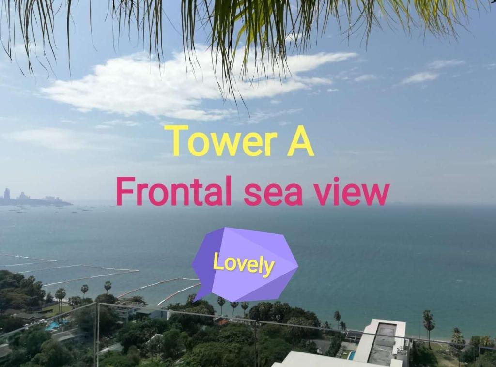 a view of the ocean with the words tower a frontal sea view at The Riviera Wongamat Hong Apartment in Pattaya North
