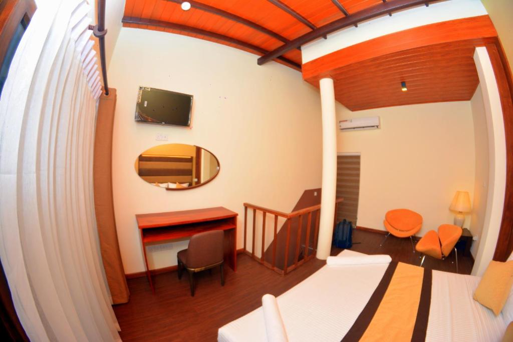 Postel nebo postele na pokoji v ubytování Beach Corridor Hotel & Spa with Free Airport shuttle