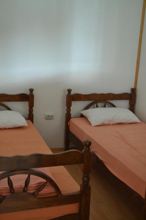 Postel nebo postele na pokoji v ubytování Ada Bojana Apartmani
