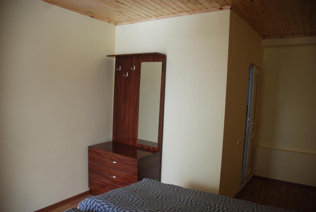Postel nebo postele na pokoji v ubytování Gogi Jafaridze's Guesthouse