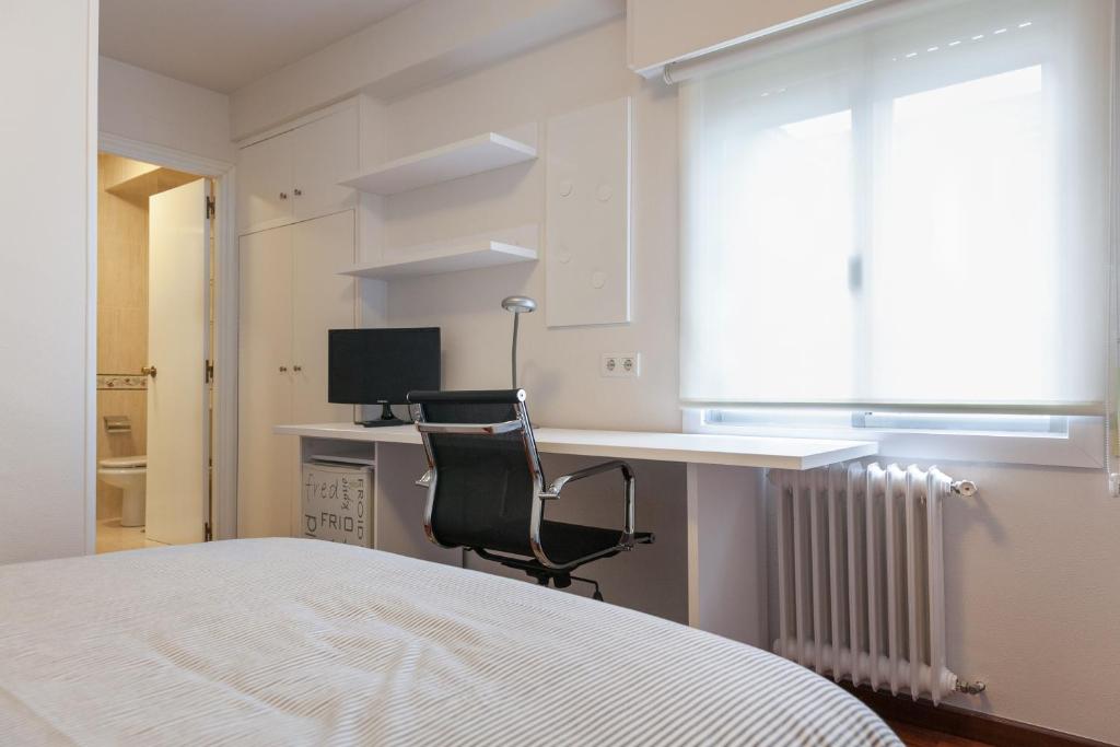 Televízia a/alebo spoločenská miestnosť v ubytovaní Pension Residencia F&F