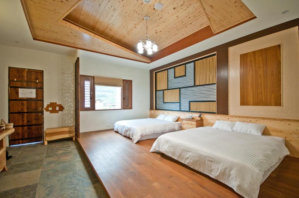 Postel nebo postele na pokoji v ubytování ChunYang Homestay春陽一品居