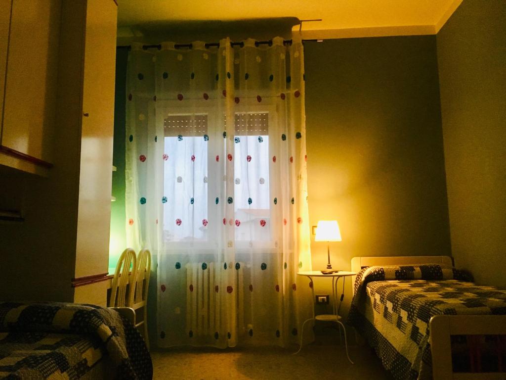 Posteľ alebo postele v izbe v ubytovaní B&B AMICI MIEI