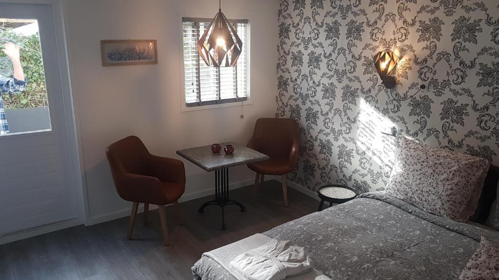 Postel nebo postele na pokoji v ubytování B&B de Valkenhorst