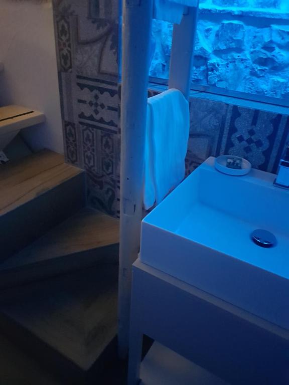 Postel nebo postele na pokoji v ubytování Casetta del Pescatore