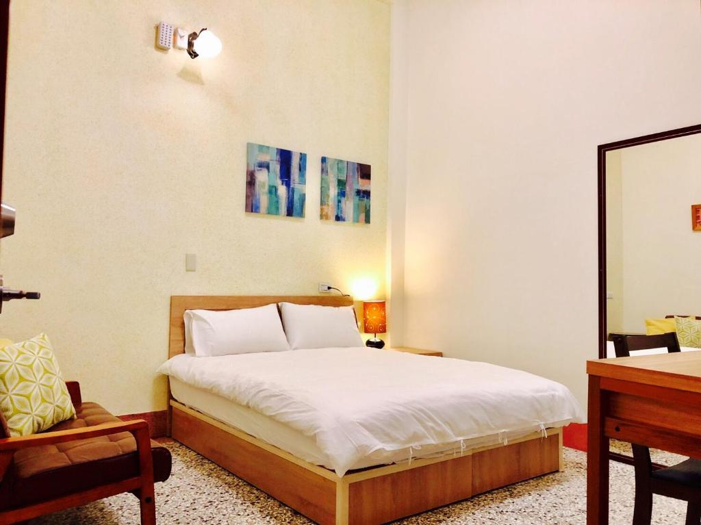 Katil atau katil-katil dalam bilik di Freedom B&B