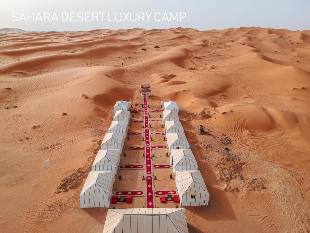 a desert luxury camp in the desert at Sahara Desert Luxury Camp in Merzouga