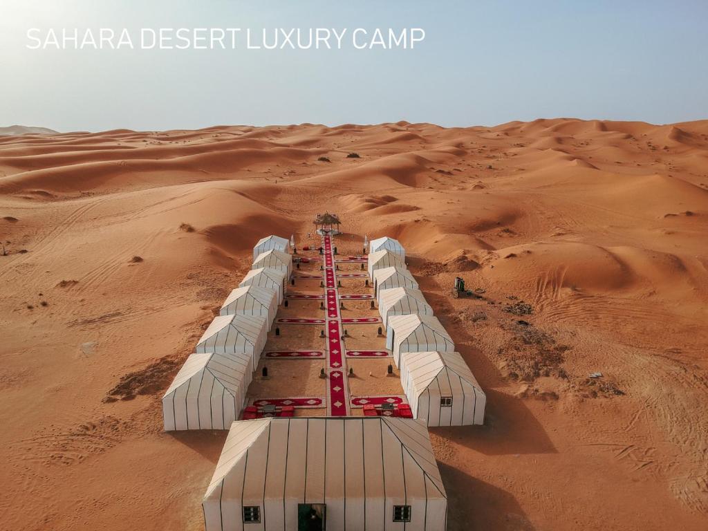 a desert luxury camp in the desert at Sahara Desert Luxury Camp in Merzouga