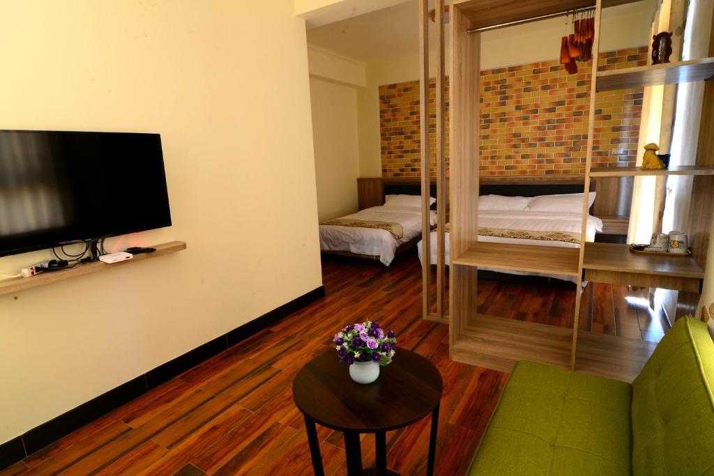 TV a/nebo společenská místnost v ubytování Bigger B&B