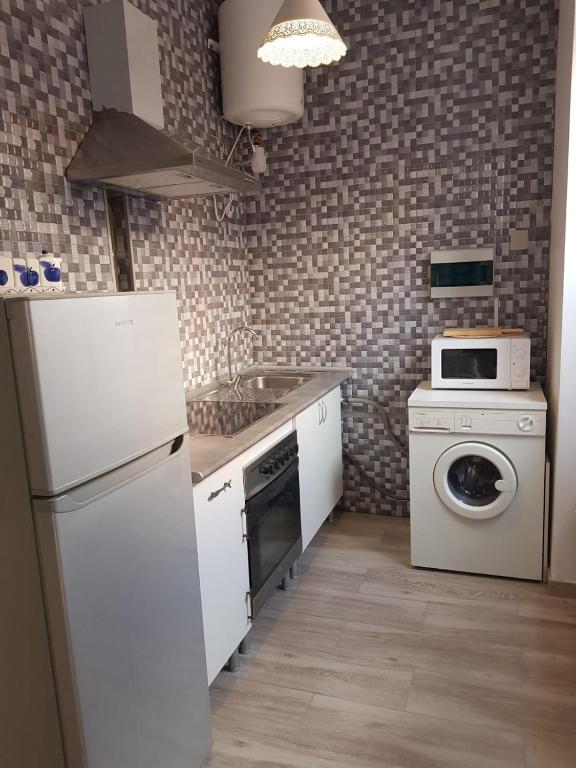 Kuchyň nebo kuchyňský kout v ubytování Estudio 54 Centro