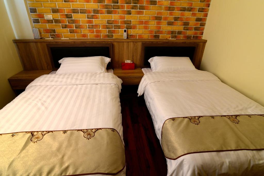 Postel nebo postele na pokoji v ubytování Bigger B&B