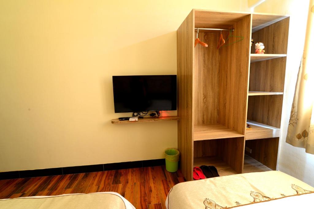 TV a/nebo společenská místnost v ubytování Bigger B&B