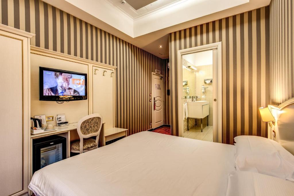 TV a/nebo společenská místnost v ubytování Trevi 41 Hotel