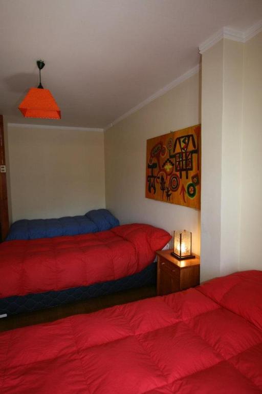 Postel nebo postele na pokoji v ubytování Backpacker's Hostel Iquique