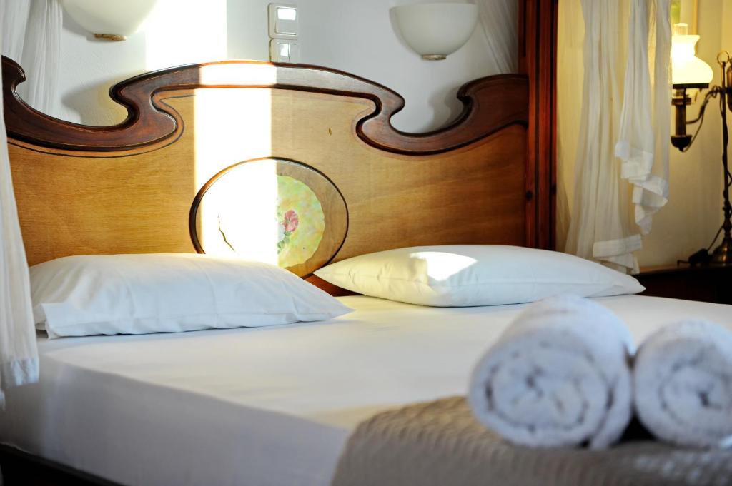 Postel nebo postele na pokoji v ubytování Alkyon Apartments & Villas Hotel