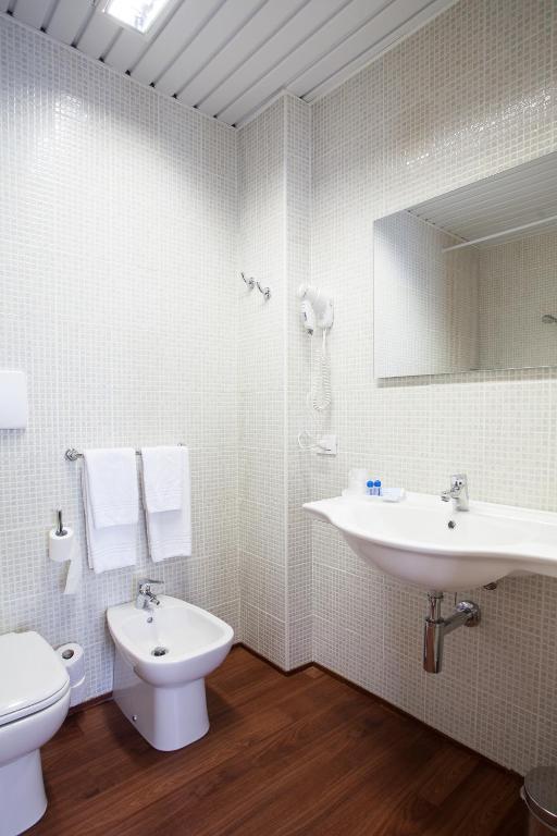 Koupelna v ubytování Hotel Esperia