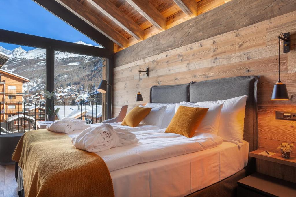 Postel nebo postele na pokoji v ubytování 22 Summits Boutique Hotel
