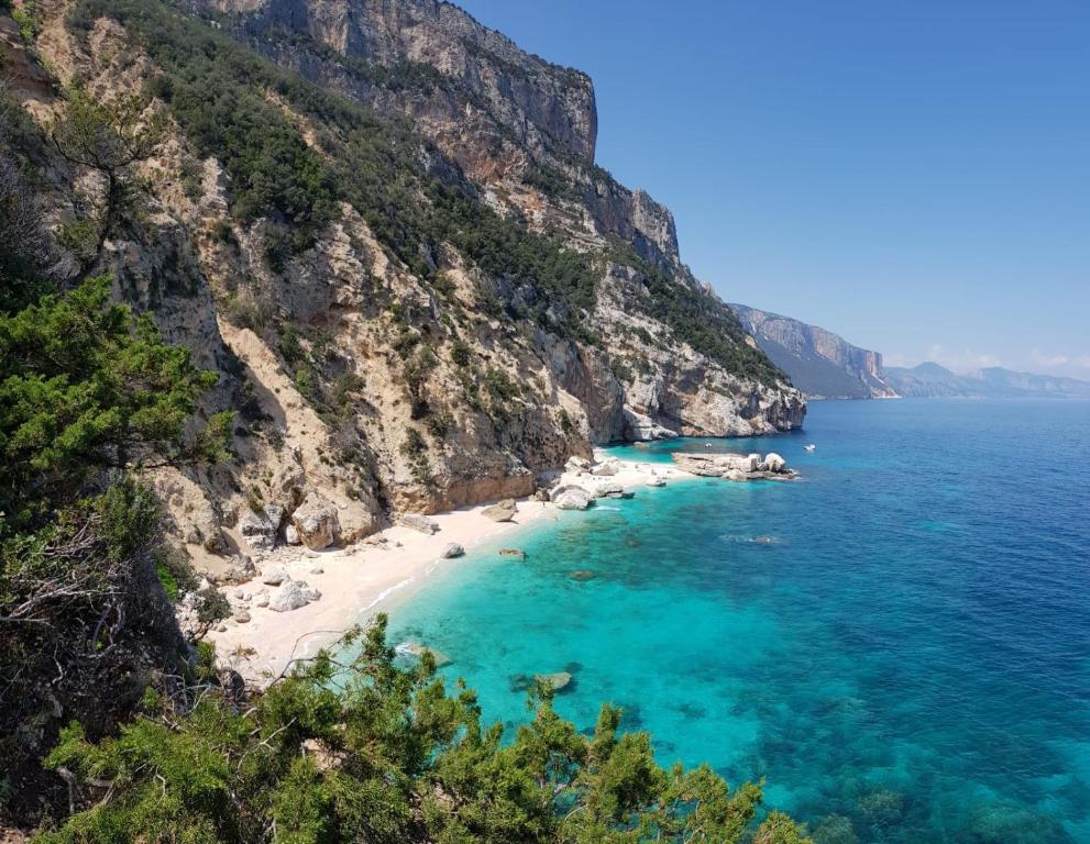 a beach on the amalfi coast in italy at Appartamento Sole in Cala Gonone
