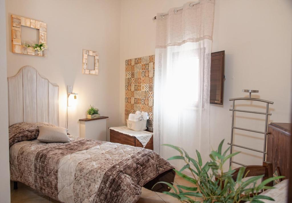Postel nebo postele na pokoji v ubytování Bed and Breakfast Conte Luna
