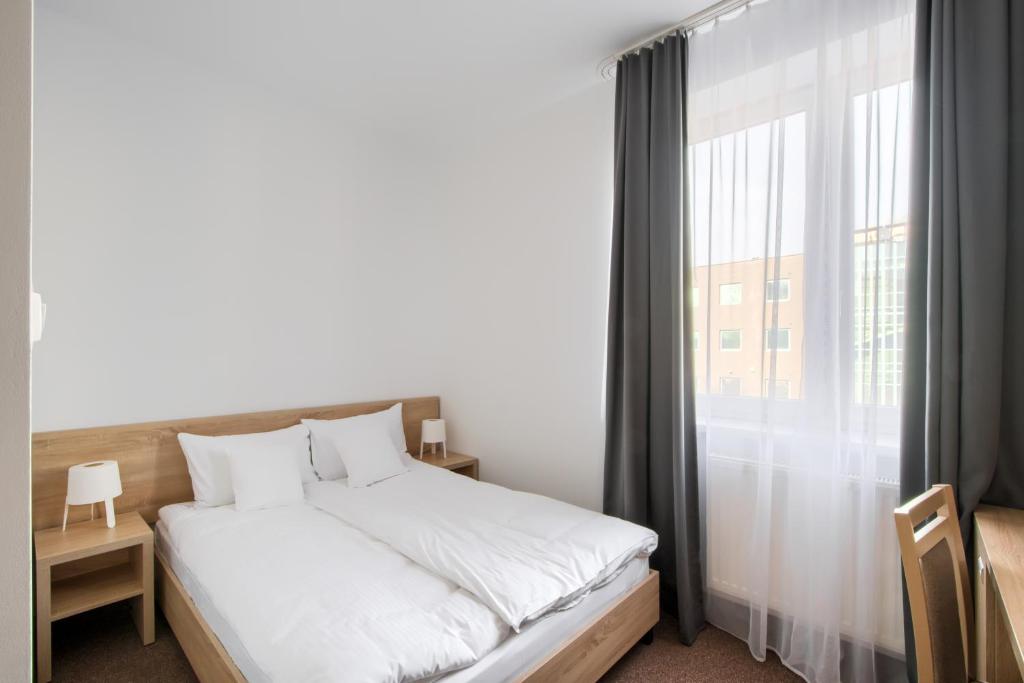 Postel nebo postele na pokoji v ubytování Patra