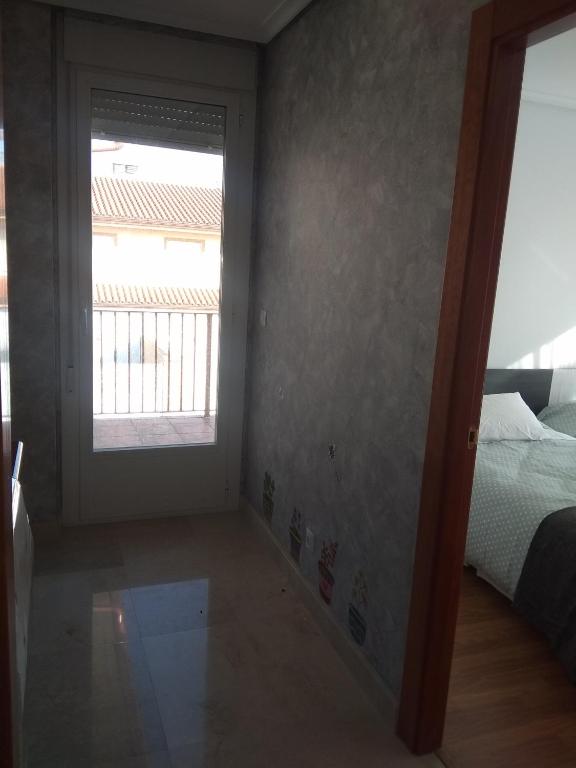 Postel nebo postele na pokoji v ubytování La casita de Villalarreina