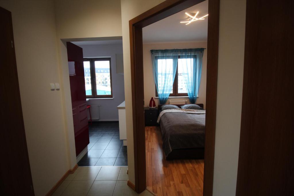 Posteľ alebo postele v izbe v ubytovaní Apartament Józefa 1