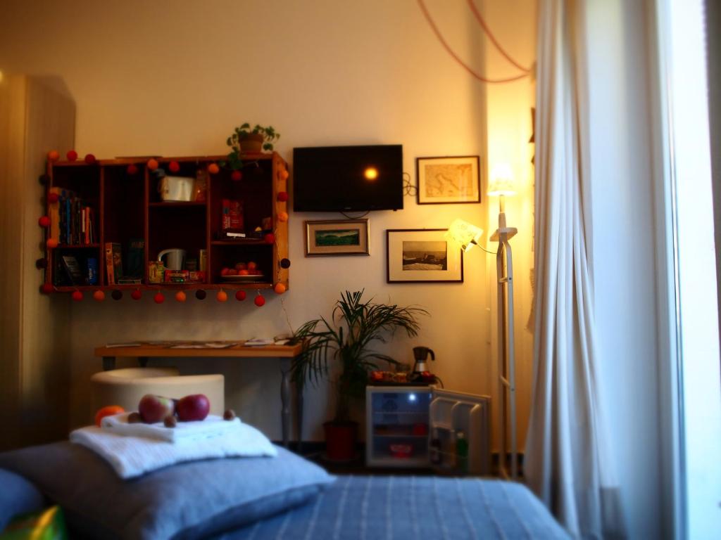 Posteľ alebo postele v izbe v ubytovaní B&B Cernaia 42