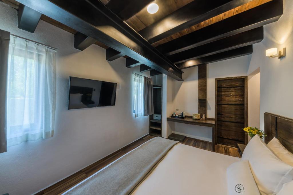 TV a/nebo společenská místnost v ubytování Matian Hotel Boutique