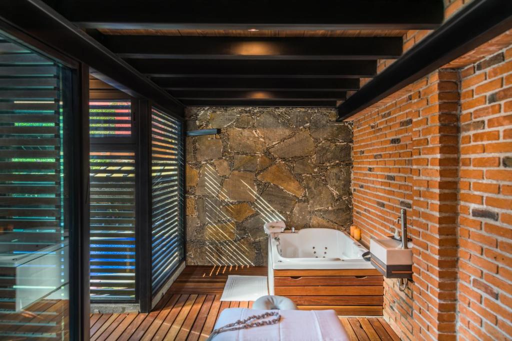 Postel nebo postele na pokoji v ubytování Matian Hotel Boutique