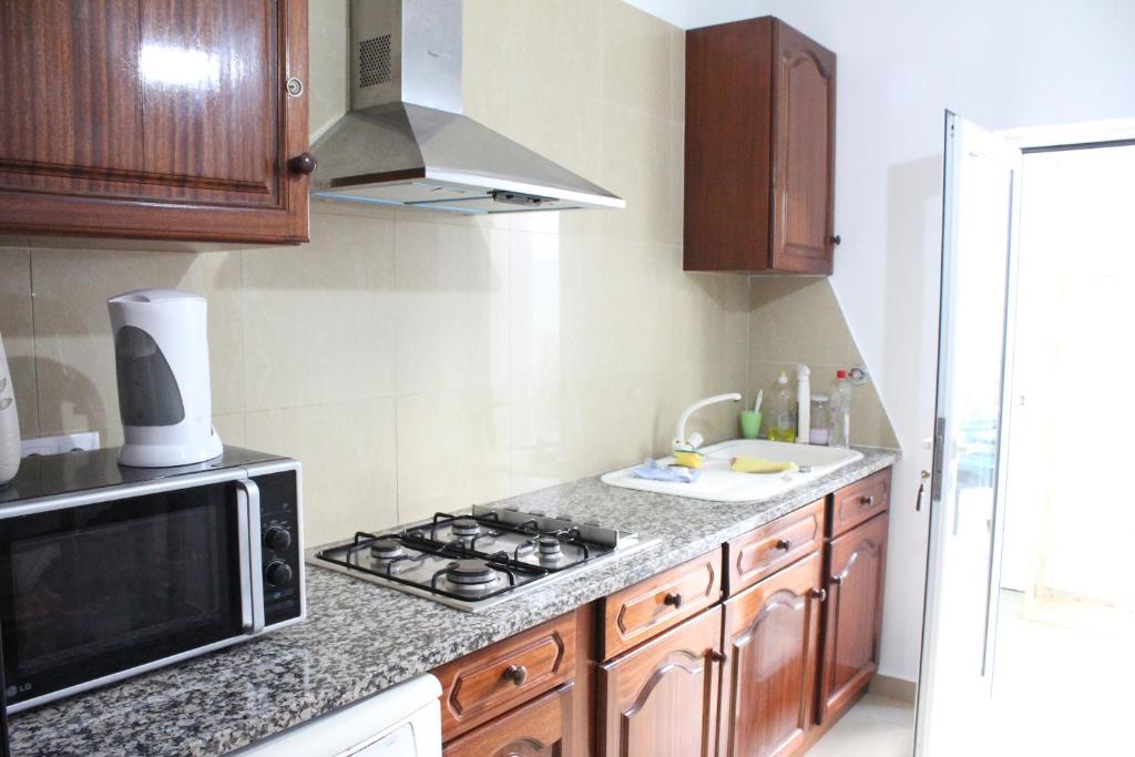 Cucina o angolo cottura di Vivenda Rosa Lagos