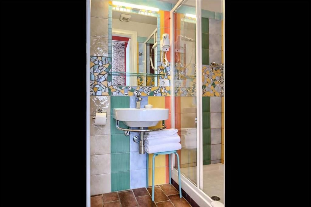 A bathroom at Alloggio per uso turistico D'Ambrosio Antonella Gli Scipioni 53