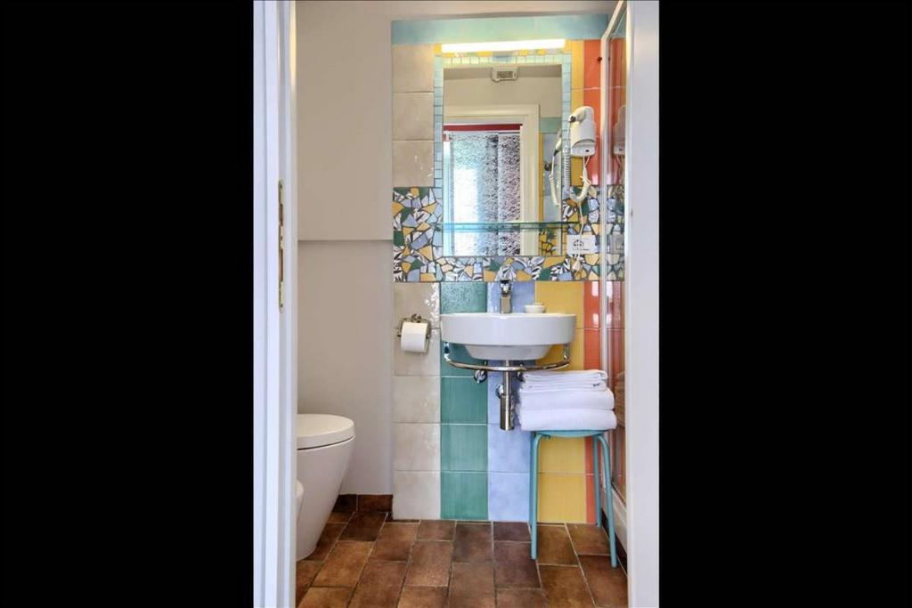 A bathroom at Alloggio per uso turistico D'Ambrosio Antonella Gli Scipioni 53