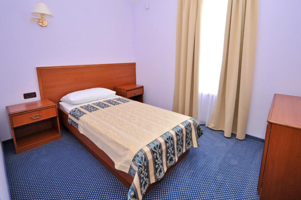 Postel nebo postele na pokoji v ubytování Villa Kastel