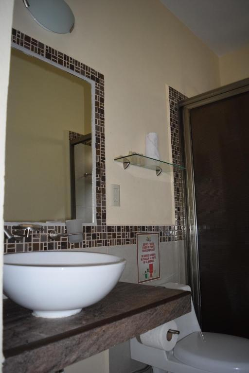 Koupelna v ubytování Hotel Tuparenda