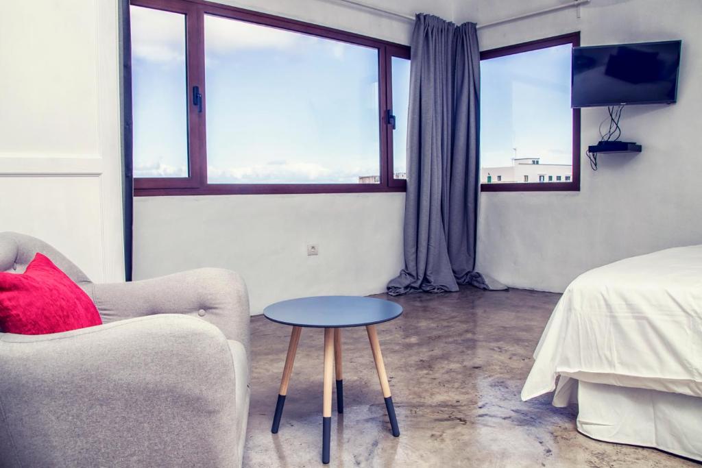 TV a/nebo společenská místnost v ubytování Casa De La Nobleza