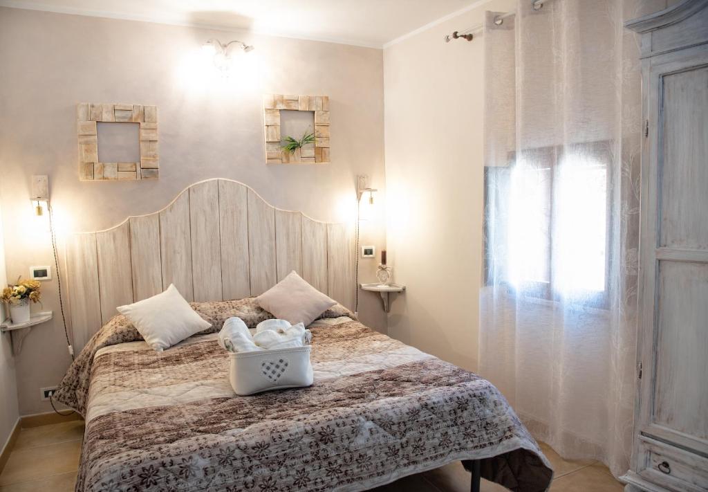 Postel nebo postele na pokoji v ubytování Bed and Breakfast Conte Luna
