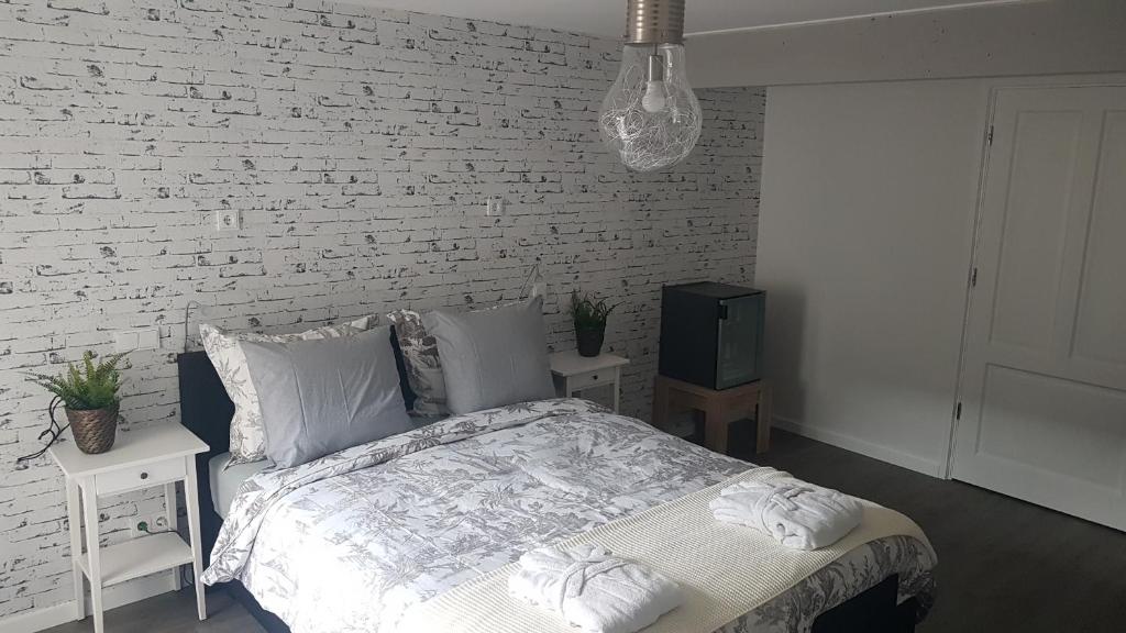 Postel nebo postele na pokoji v ubytování B&B de Valkenhorst