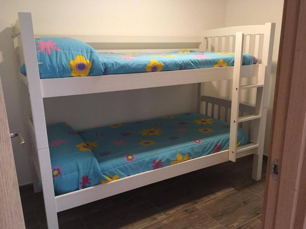 Postel nebo postele na pokoji v ubytování Casa rural Camelle Casa dos avós