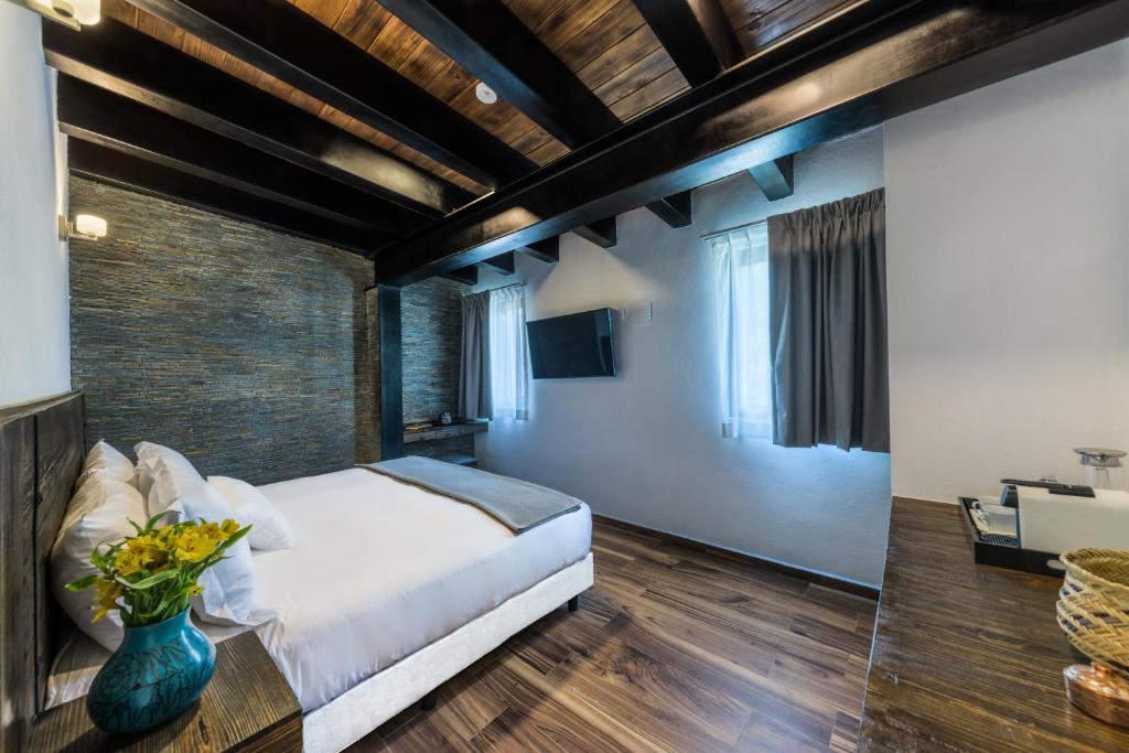 Postel nebo postele na pokoji v ubytování Matian Hotel Boutique