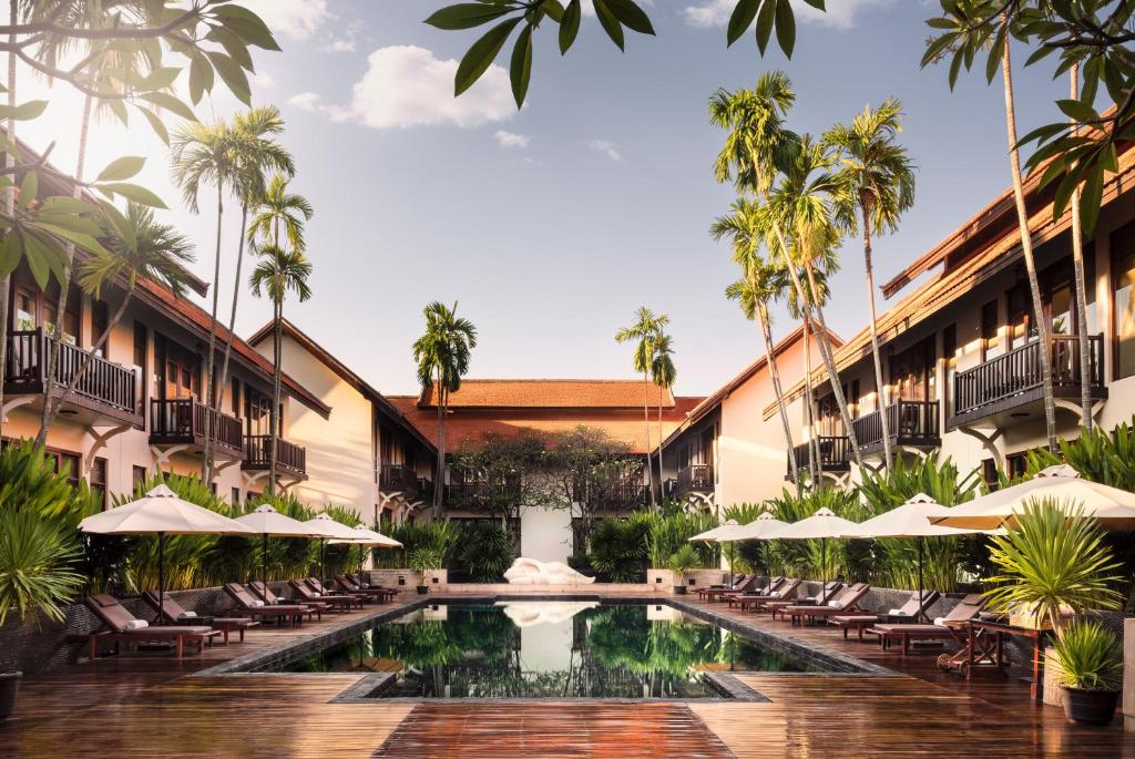 The swimming pool at or close to Anantara Angkor Resort