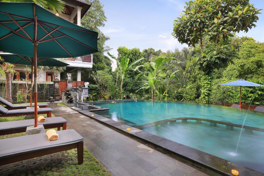 Bazén v ubytování Ketut's Place Cottage Ubud nebo v jeho okolí