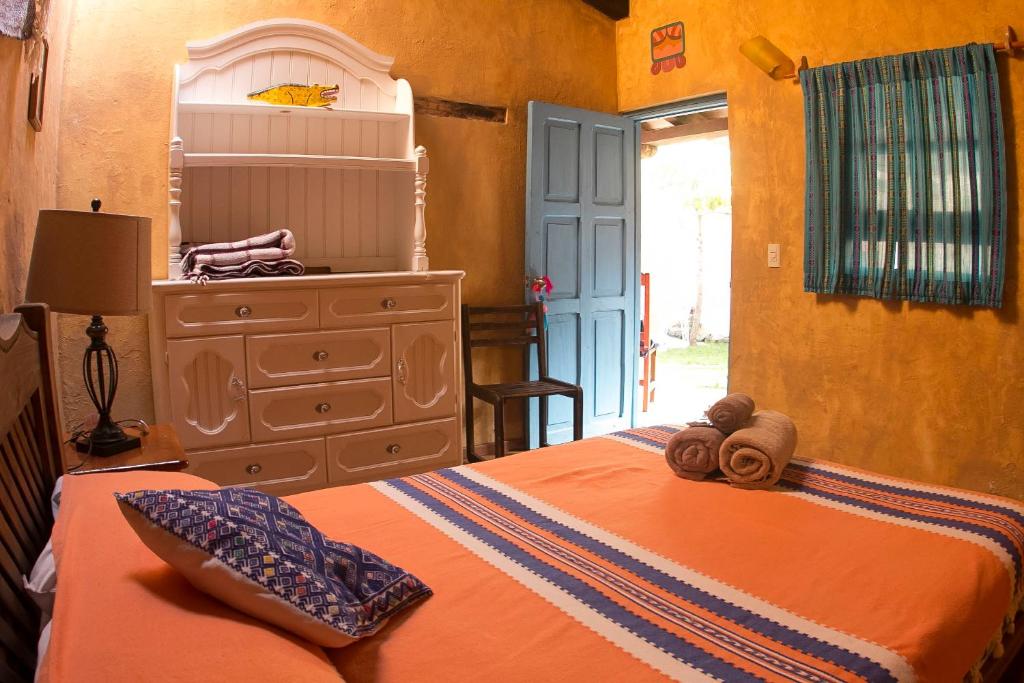 Postel nebo postele na pokoji v ubytování Posada del Abuelito (Hostel)