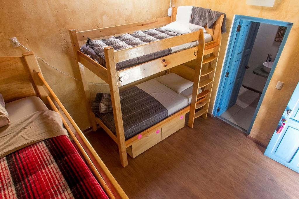 Postel nebo postele na pokoji v ubytování Posada del Abuelito (Hostel)